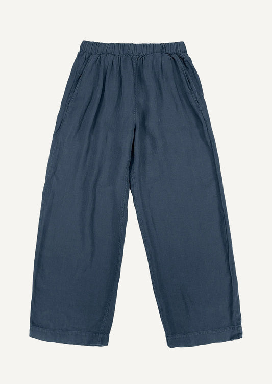 A pair of flowy hemp pants in navy.