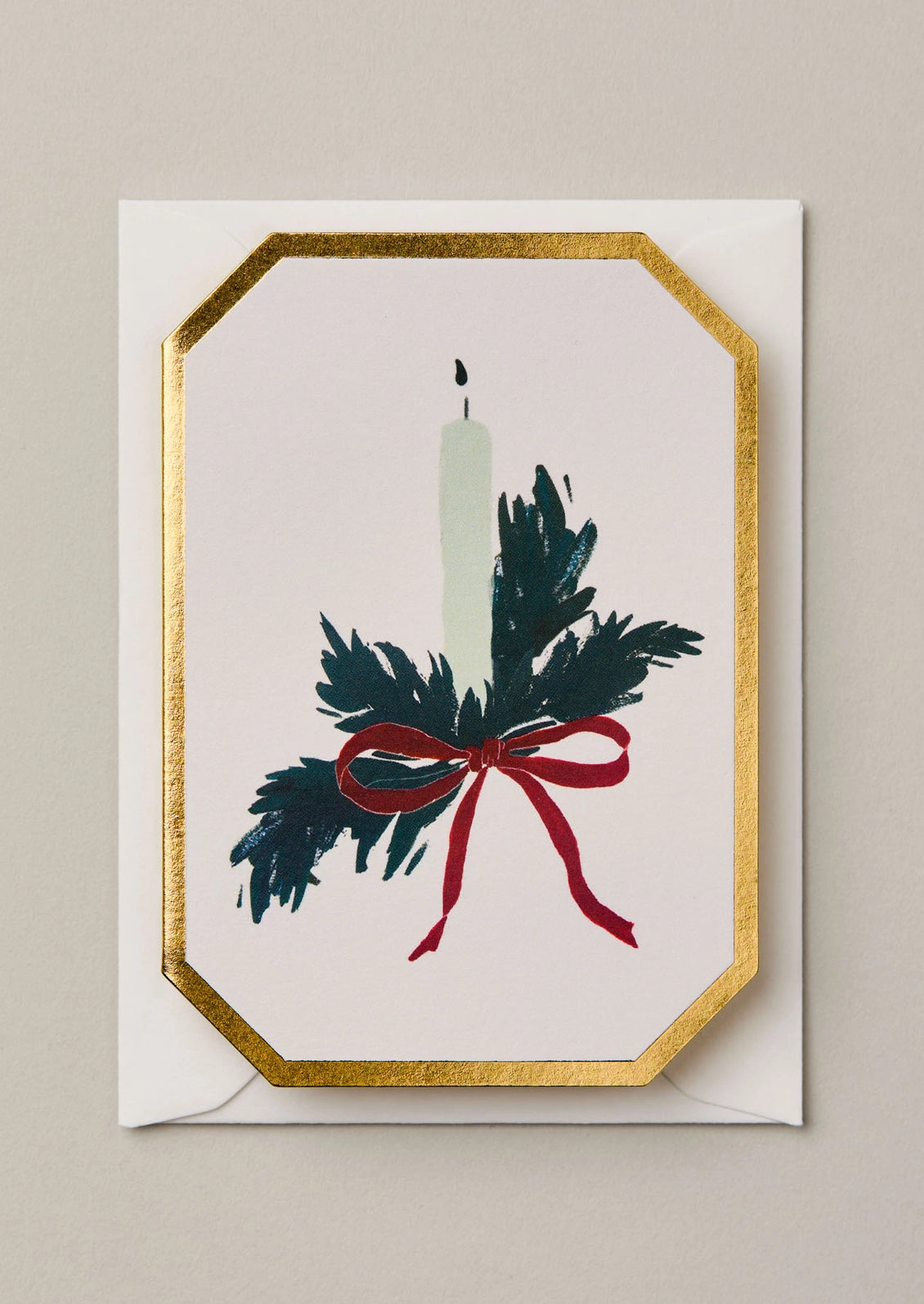 A mini die cut greeting card with candlestick illustration.