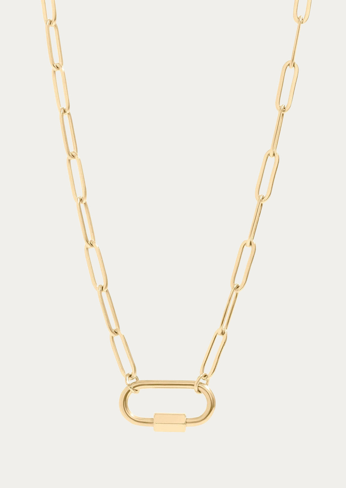 A gold chain necklace with a small functional carabiner.