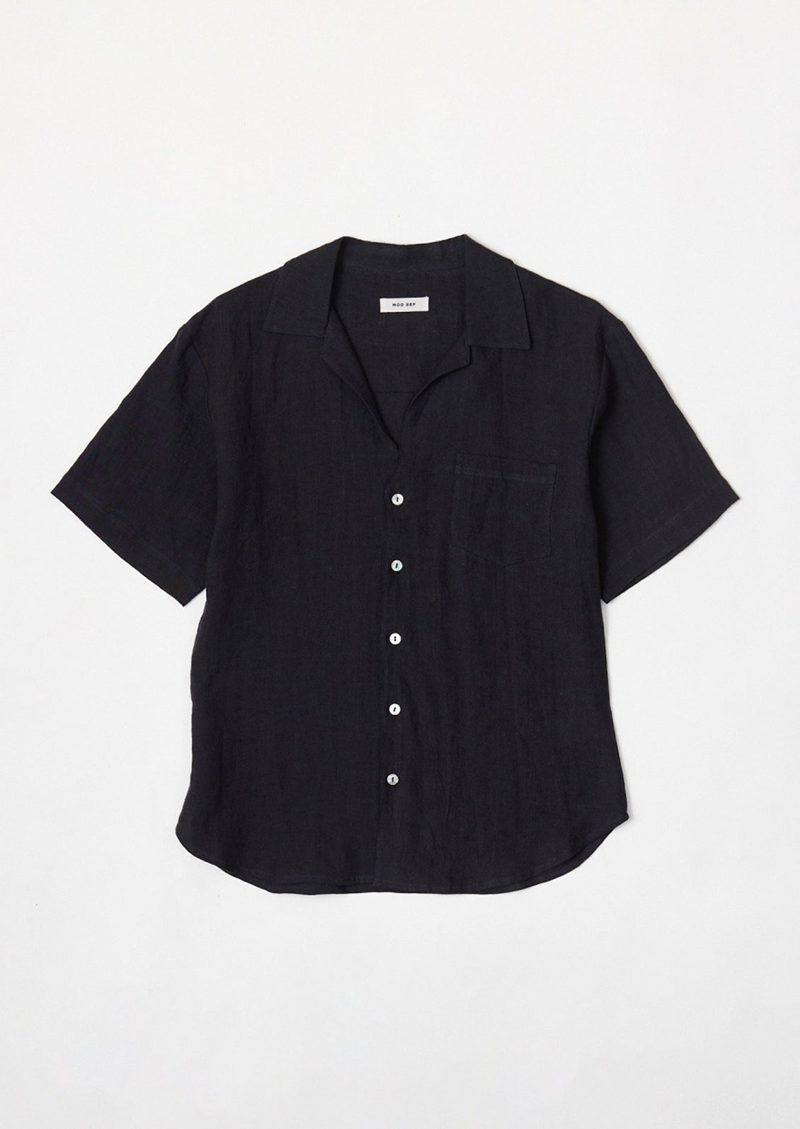 A black linen shortsleeved button-up.