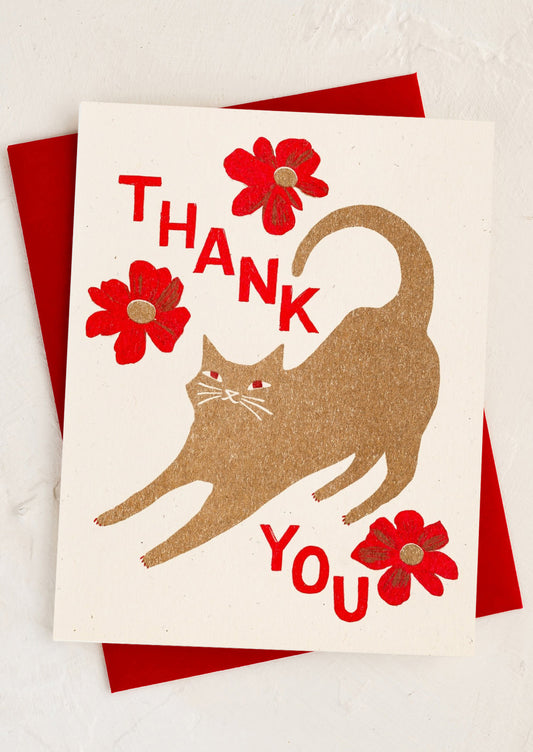 A card with image of cat stretching, text reads "Thank you".