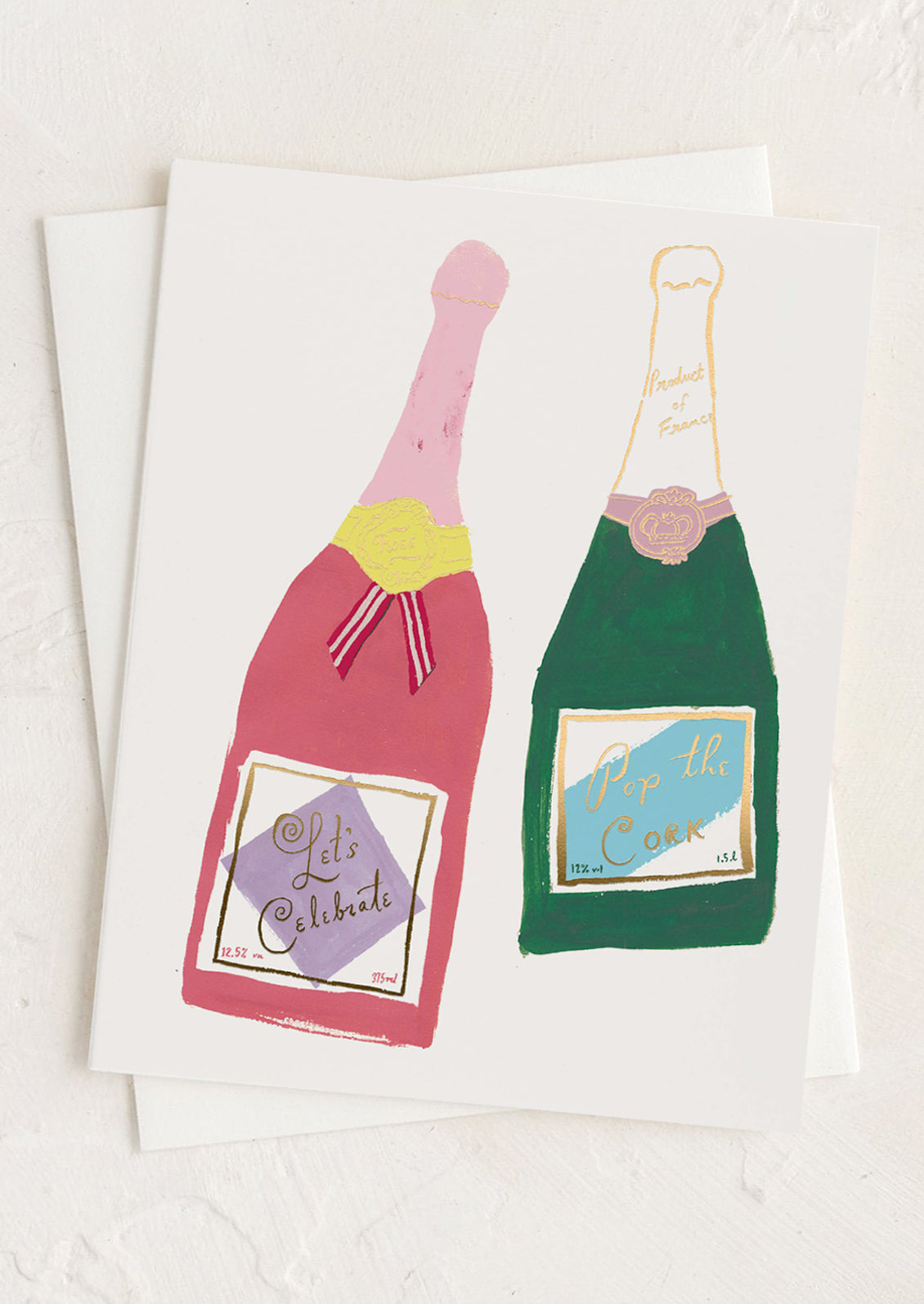 A greeting card with illustration of two bottles of champagne.