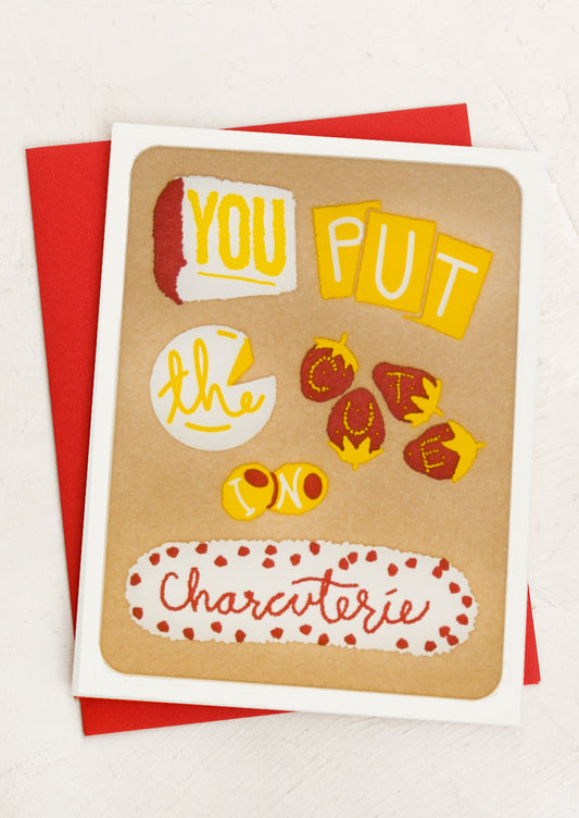 A greeting card with fruit and cheese spelling out "You put the cute in charcuterie".