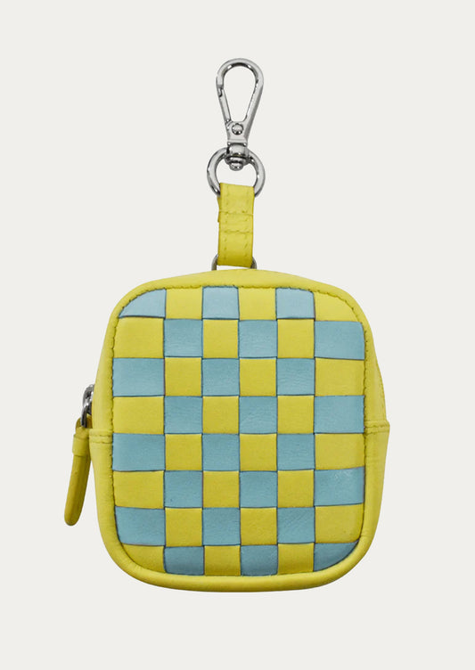 A yellow and turquoise leather coin pouch with a checkerboard pattern.