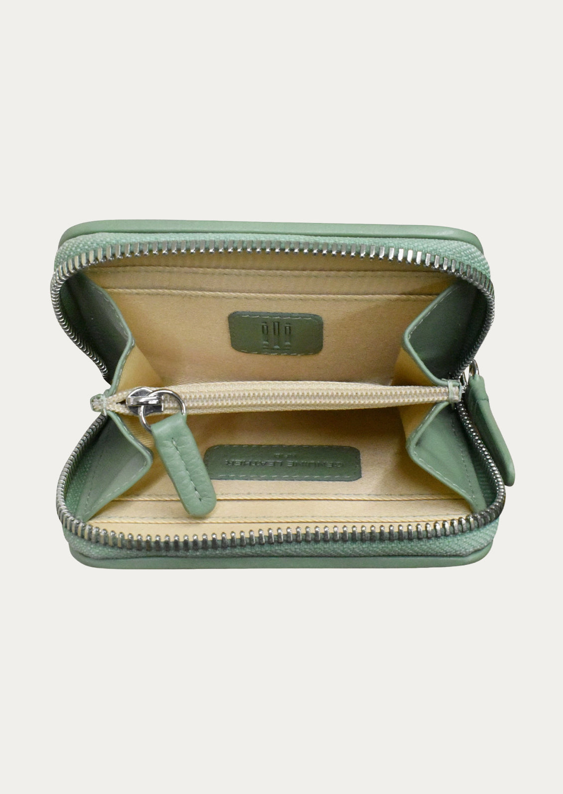 The inside of a leather wallet showing two compartments.