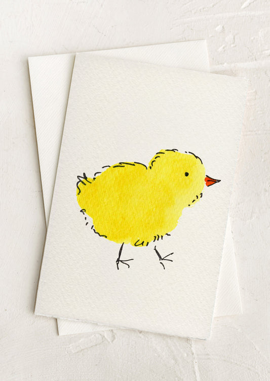 A greeting card with a yellow chick illustration on a white background