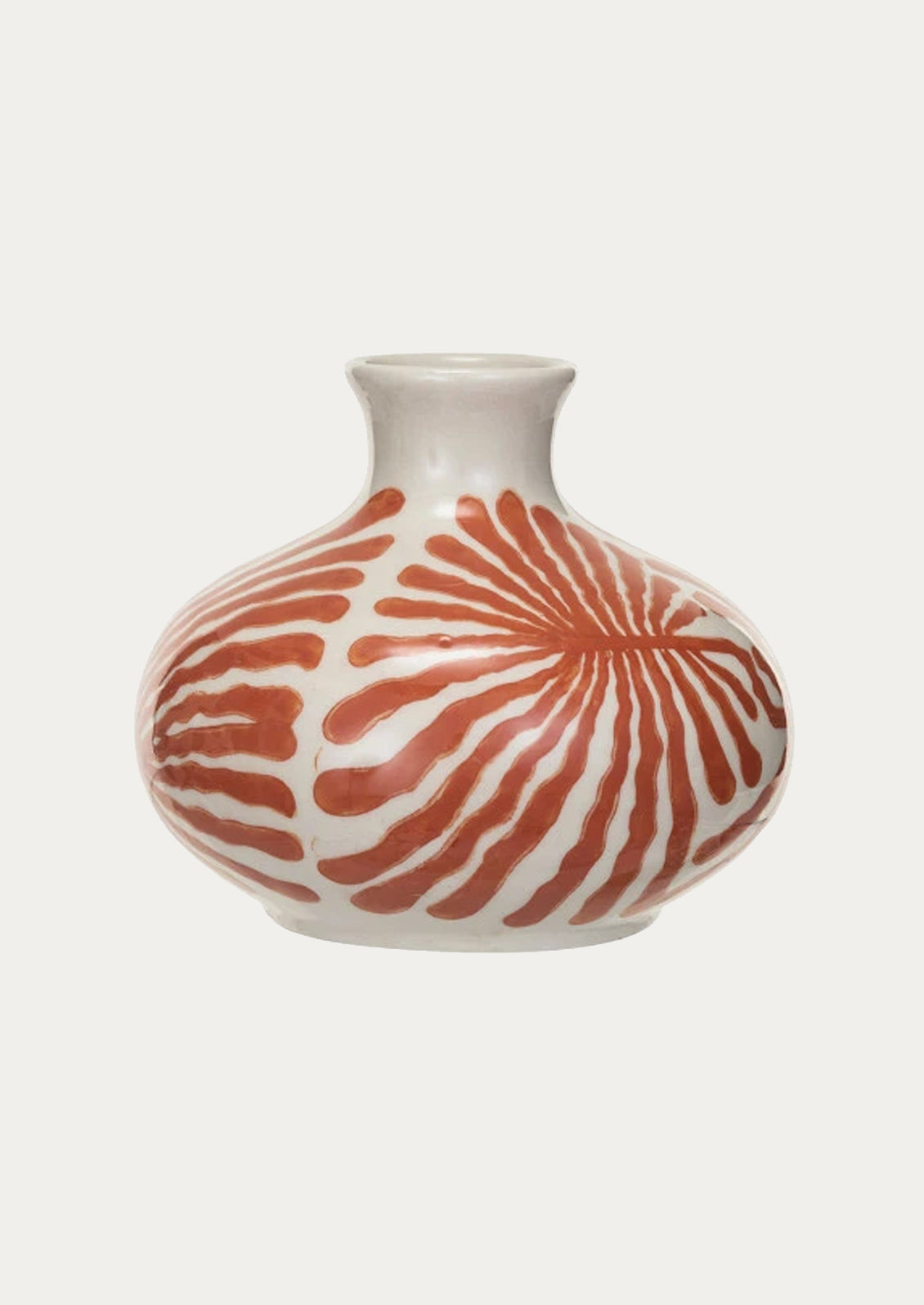 A vase in white with coral seaweed/leaf pattern.