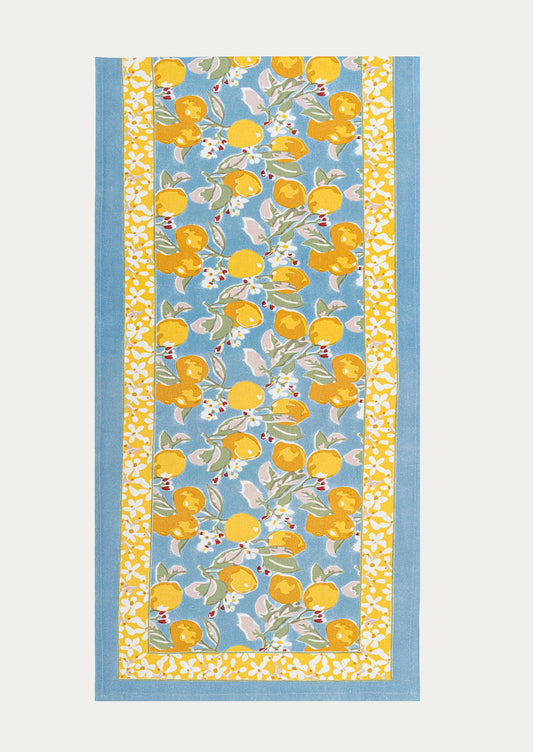 Fabric panel with lemon and floral pattern on a blue background
