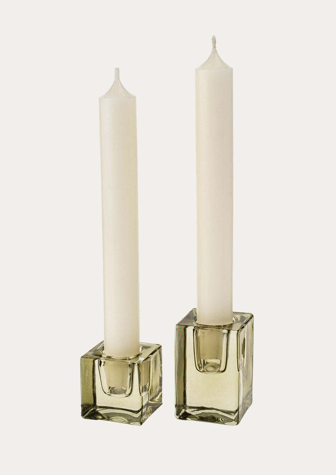 Cube shaped glass taper candle holders in moss green, two sizes shown.