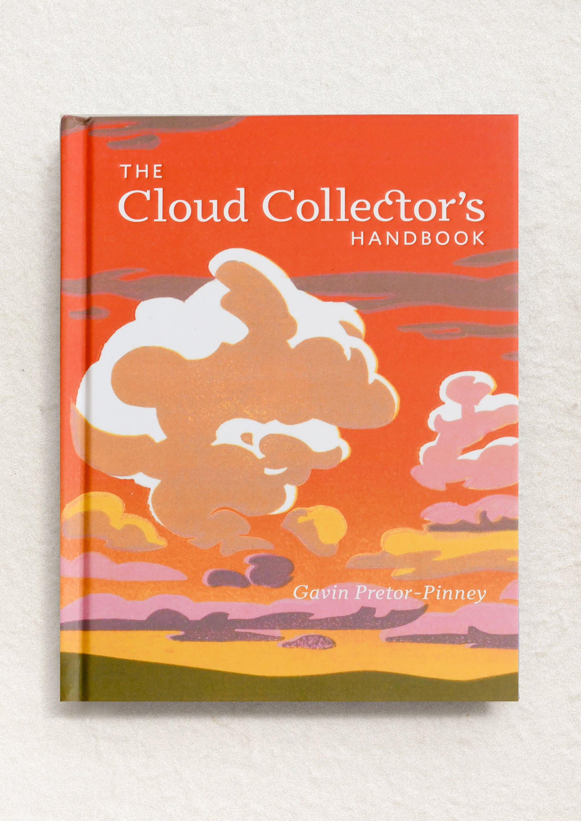 Book titled 'The Cloud Collector's Handbook' with cloud illustrations on a red background.