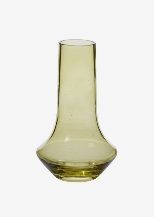 A transparent glass vase with green hue.