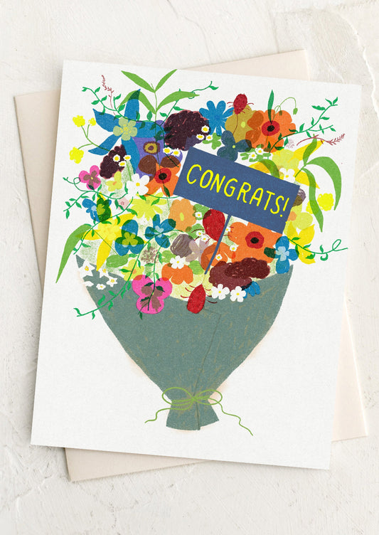 Greeting card with colorful floral design and 'Congrats!' text on a white background