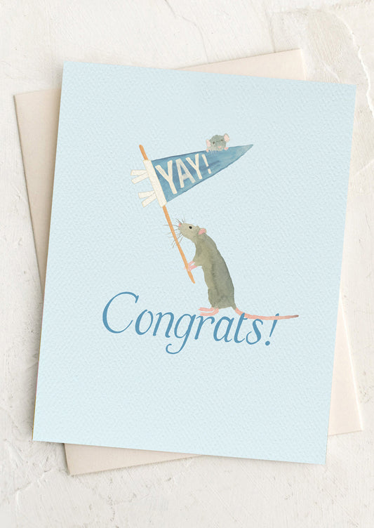 Greeting card with a mouse holding a 'YAY!' flag and 'Congrats!' text on a light blue background.