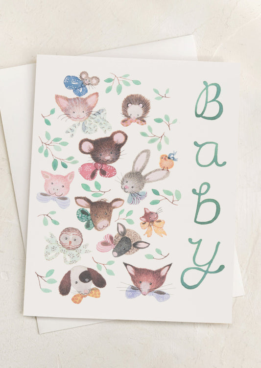 Baby shower card with illustrations of baby animals and the word 'BABY'.