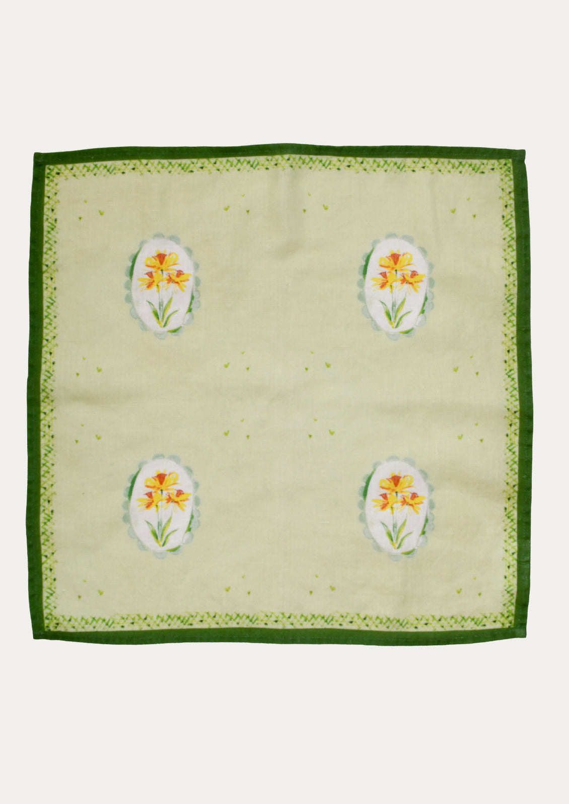 Linen napkin with printed daffodil motif.