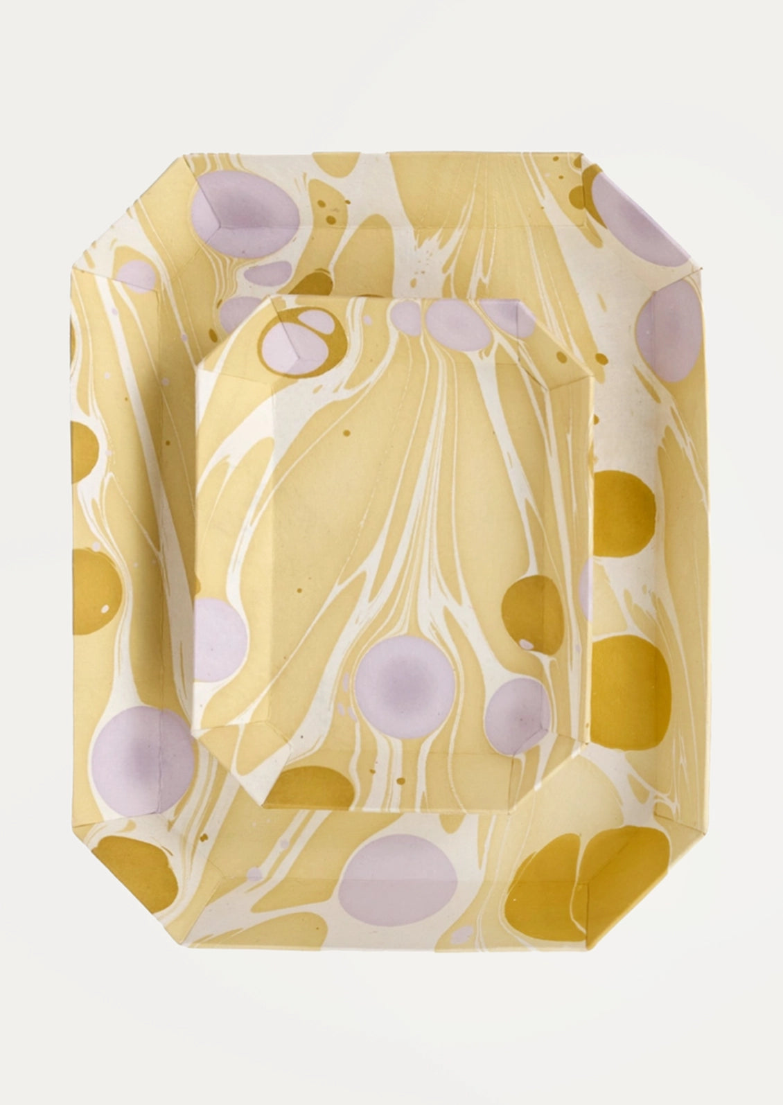 A set of marbled paper trays in a yellow, white, and lavender-purple color scheme, arranged on a clean white background.
