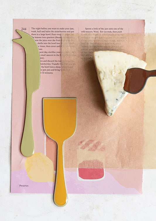 Colorful enamel cheese knives.