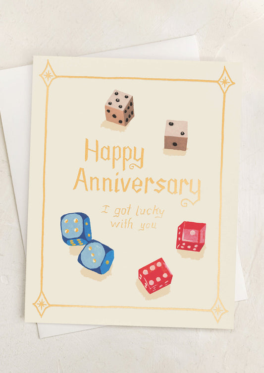 A card with illustration of dice, text reads "Happy Anniversary, I got Lucky with you".