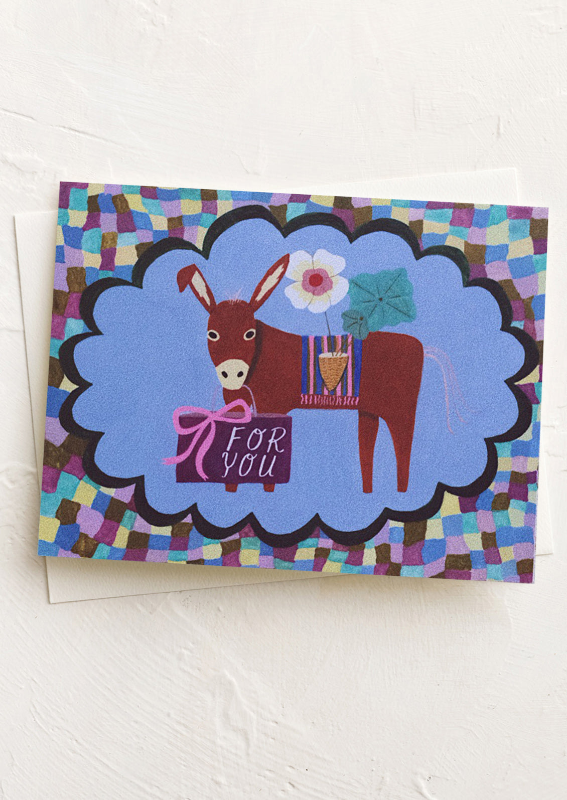Greeting card with a donkey illustration and colorful border on a white background