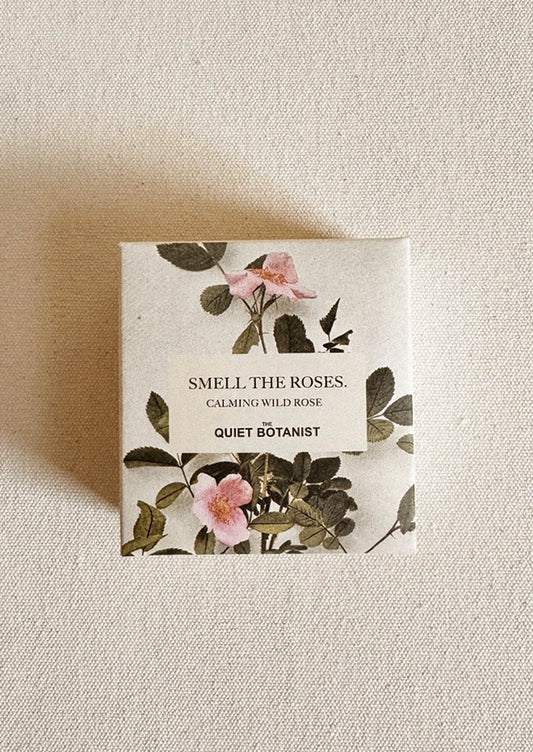 Box of 'Smell the Roses' soap by Quiet Botanist on a textured beige background.