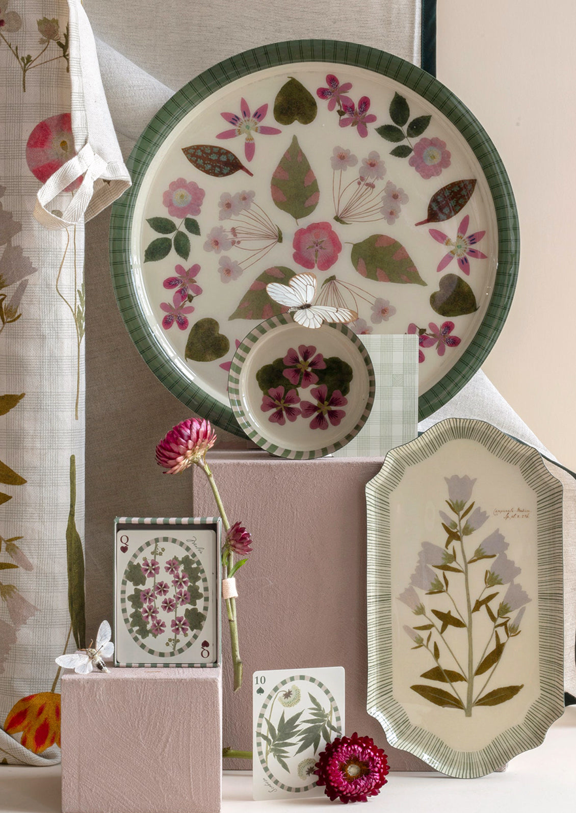 Decorative plates with floral patterns on a neutral background
