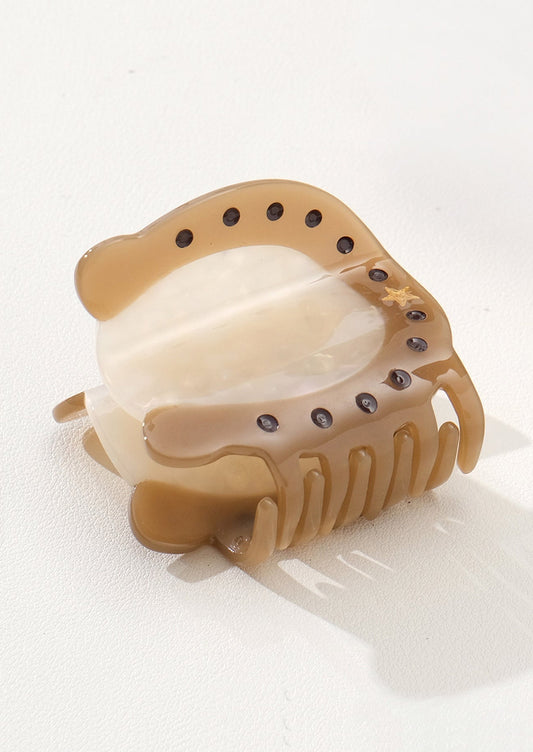 A hair claw shaped like a horseshoe