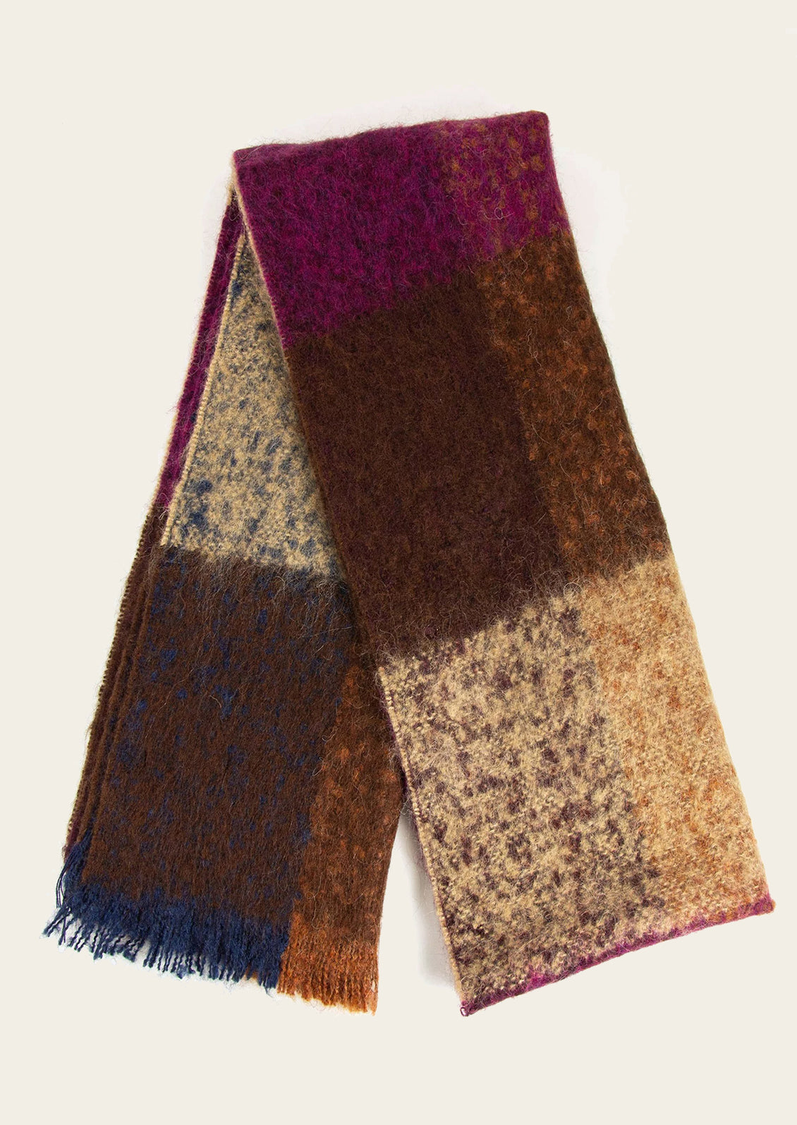 A wool-mohair scarf in brown, magenta, blue and tan check pattern.