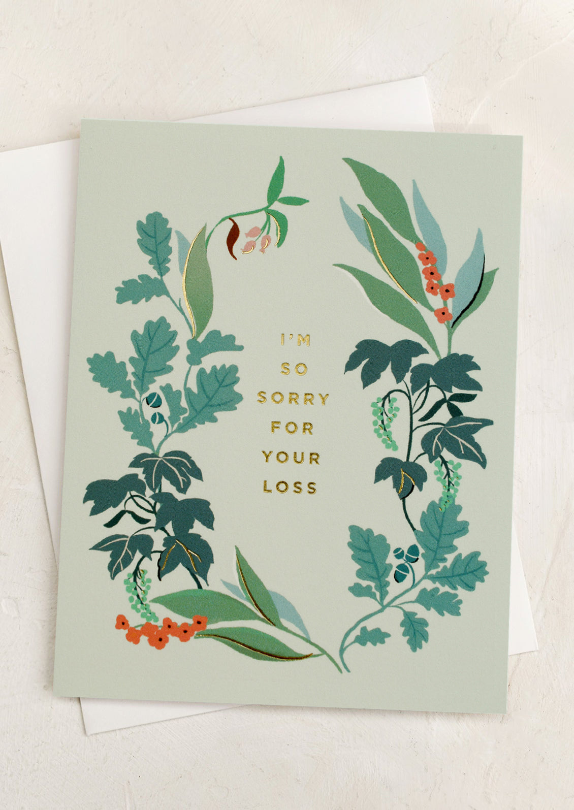 A floral print card reading "I'm so sorry for your loss".