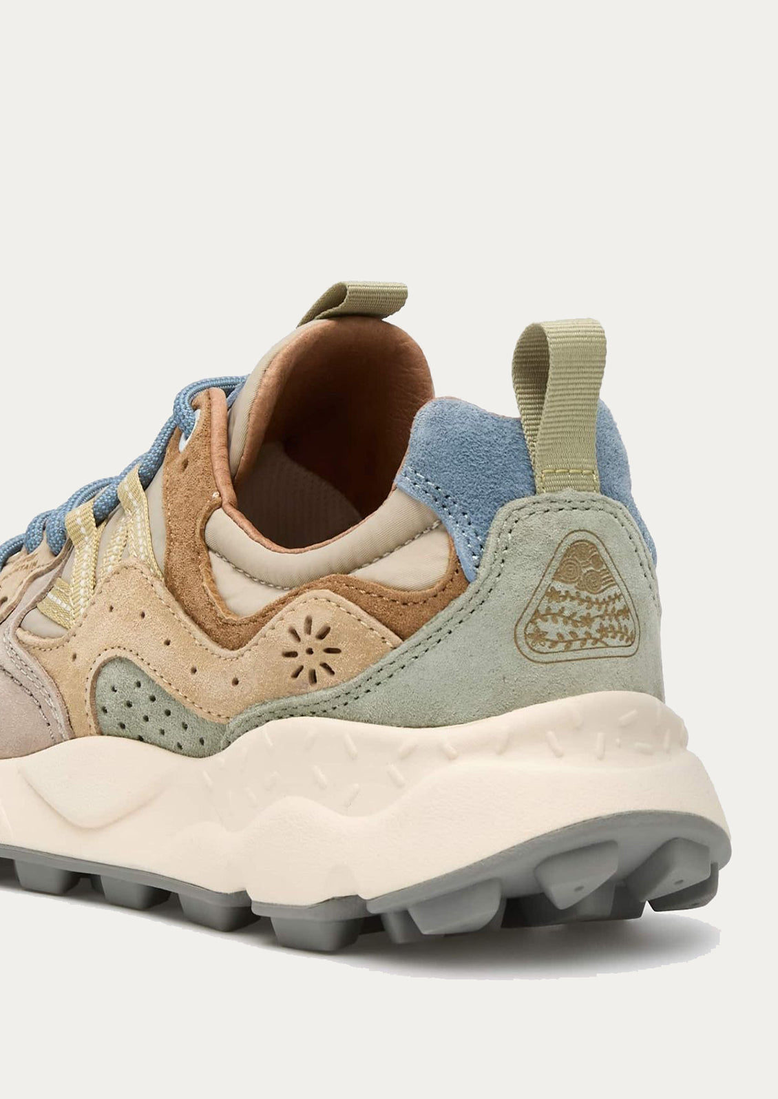 A pair of sporty sneakers in taupe/pastel multi color combo.
