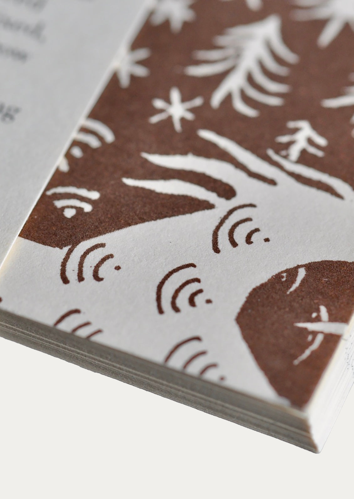 Close-up of a notebook with a brown and white pattern on the cover