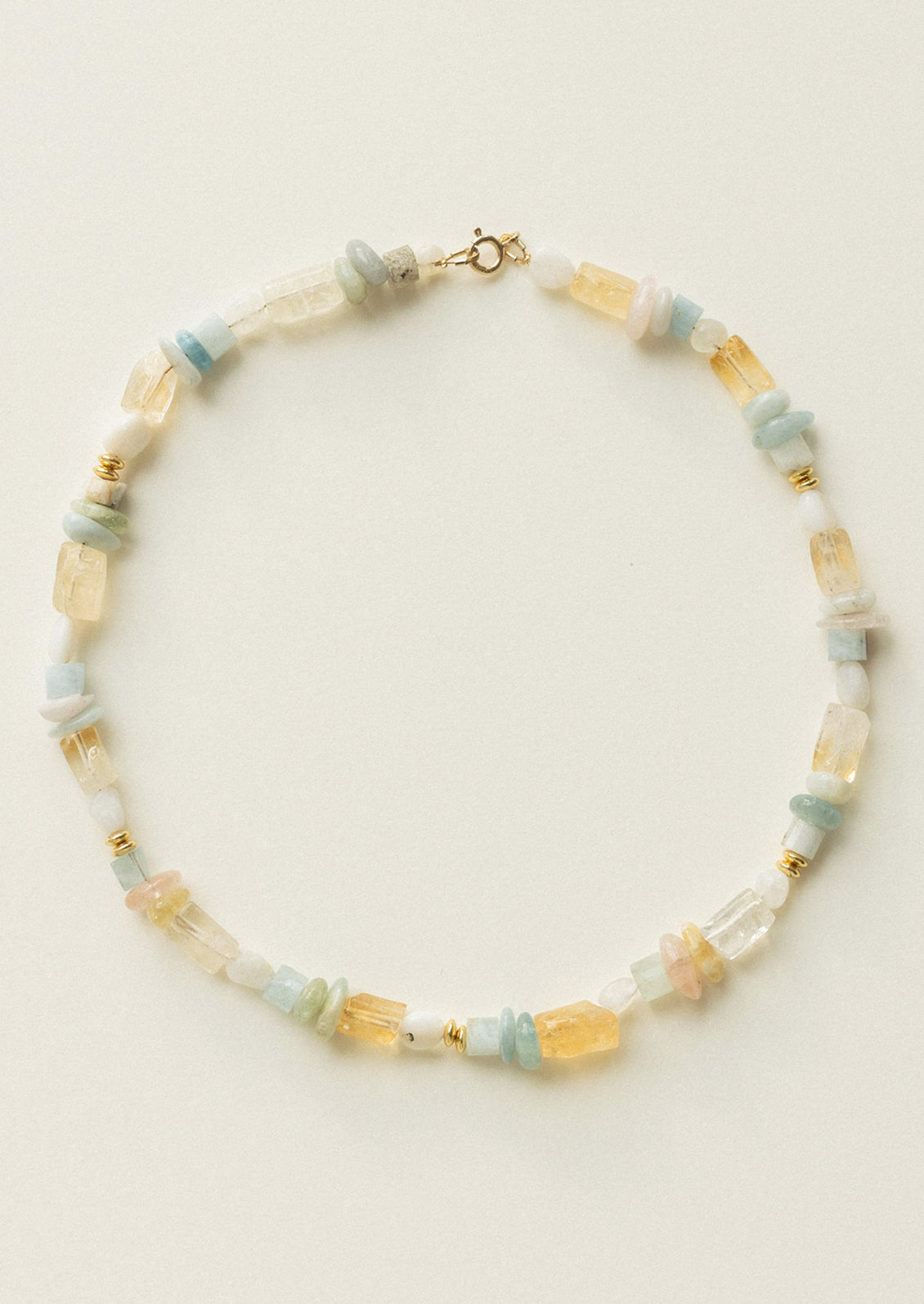 Necklace with multicolored beads on a light background