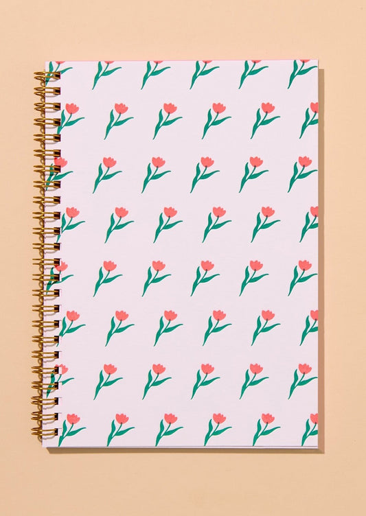 Notebook with floral pattern on a beige background