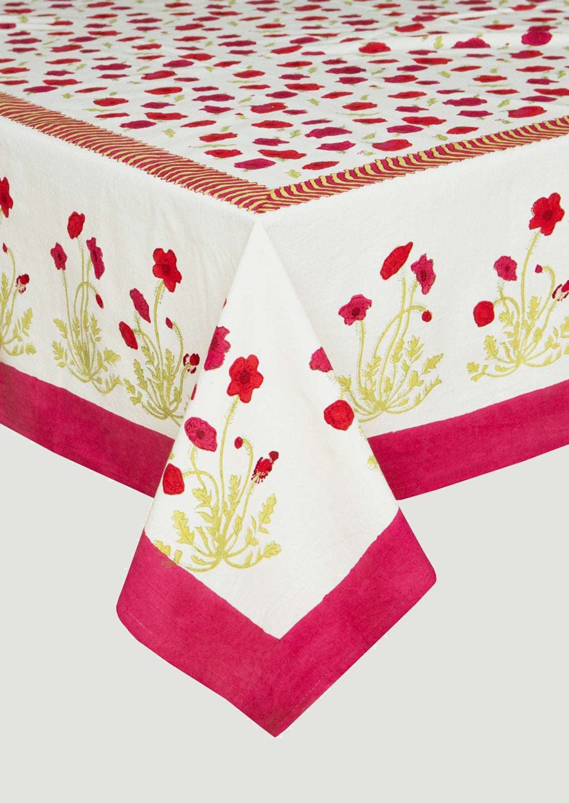 Floral-patterned tablecloth with red and pink flowers on a white background