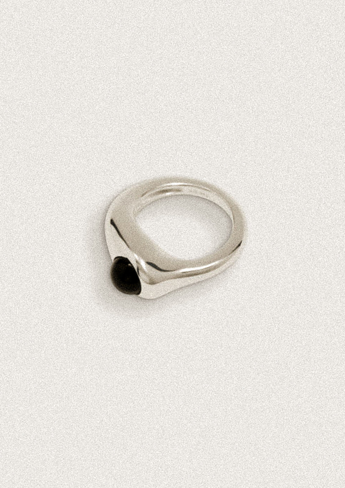 A high polish ring with onyx stone.