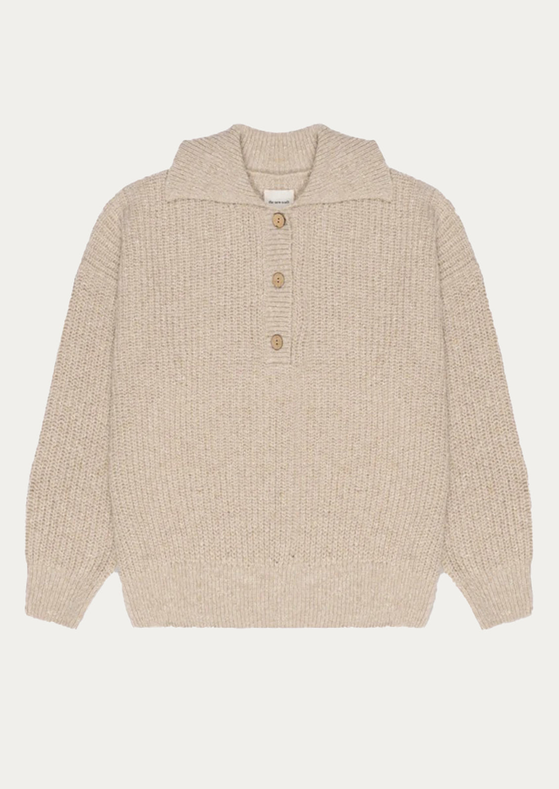 Beige knitted sweater with button details on a white background