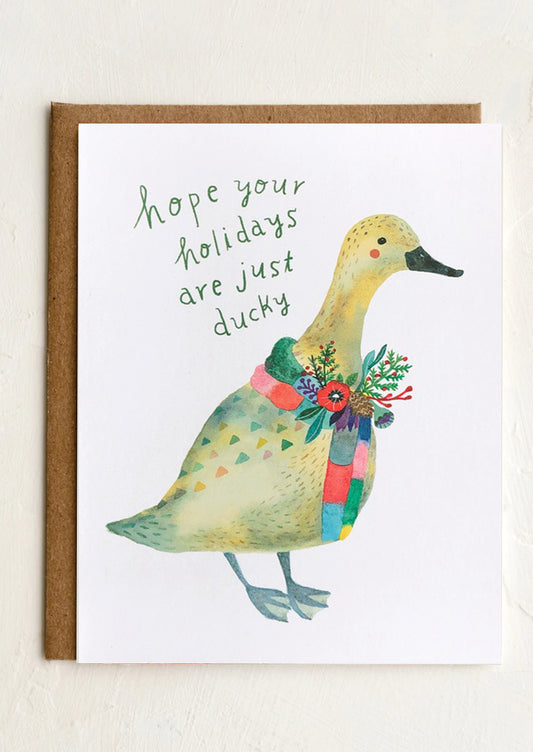 Greeting card with a duck illustration and festive text on a white background