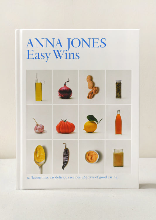 Book cover of the "Easy Wins" cookbook by Anna Jones.