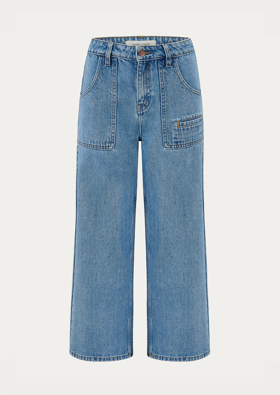 Person wearing blue jeans and a blue sweater on a white background