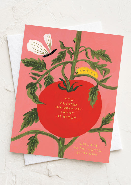A tomato print card reading "You created the greatest family heirloom. Welcome to the world little one".