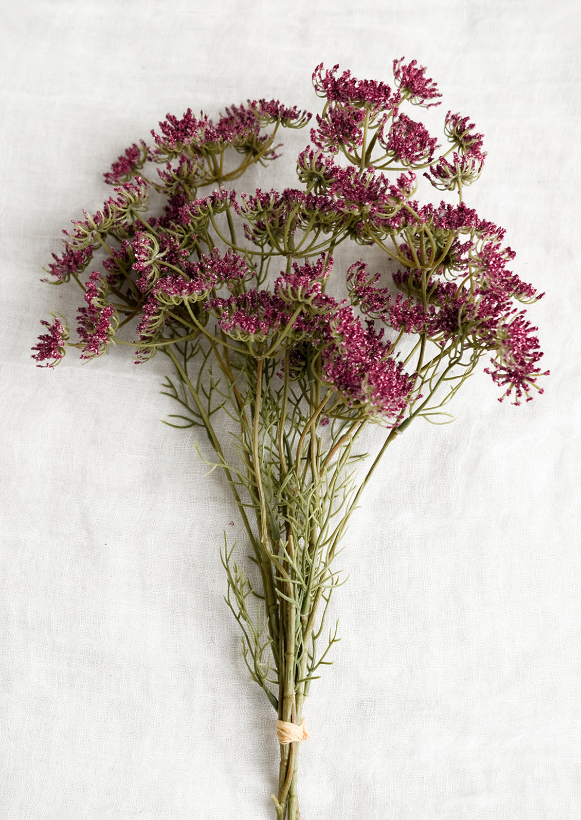A bundle of faux purple queen anne's lace.