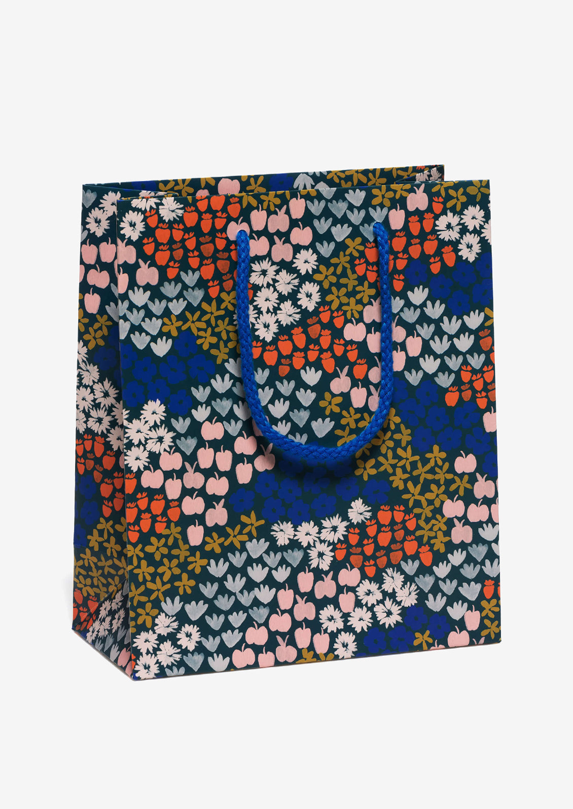 A printed gift bag with red, grey, brown and pink flower and apple print on blue background.