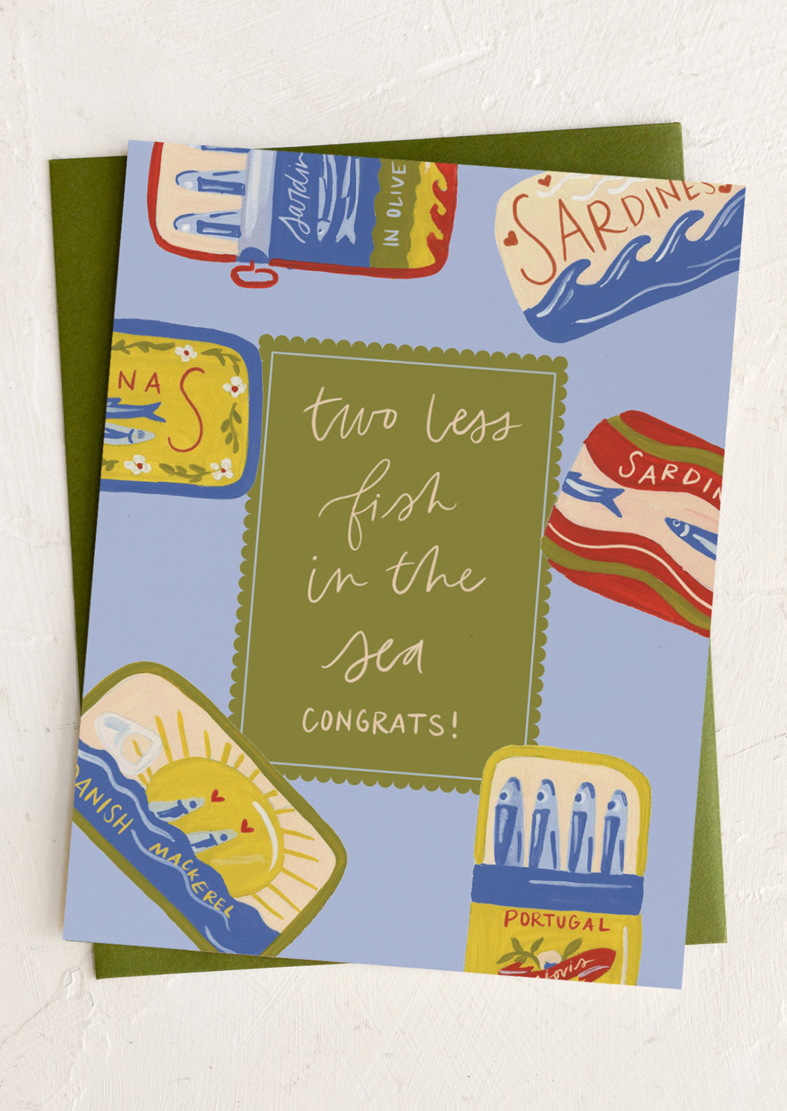 Greeting card with sardine-themed design and text 'Two less fish in the sea Congrats!' on a white background.