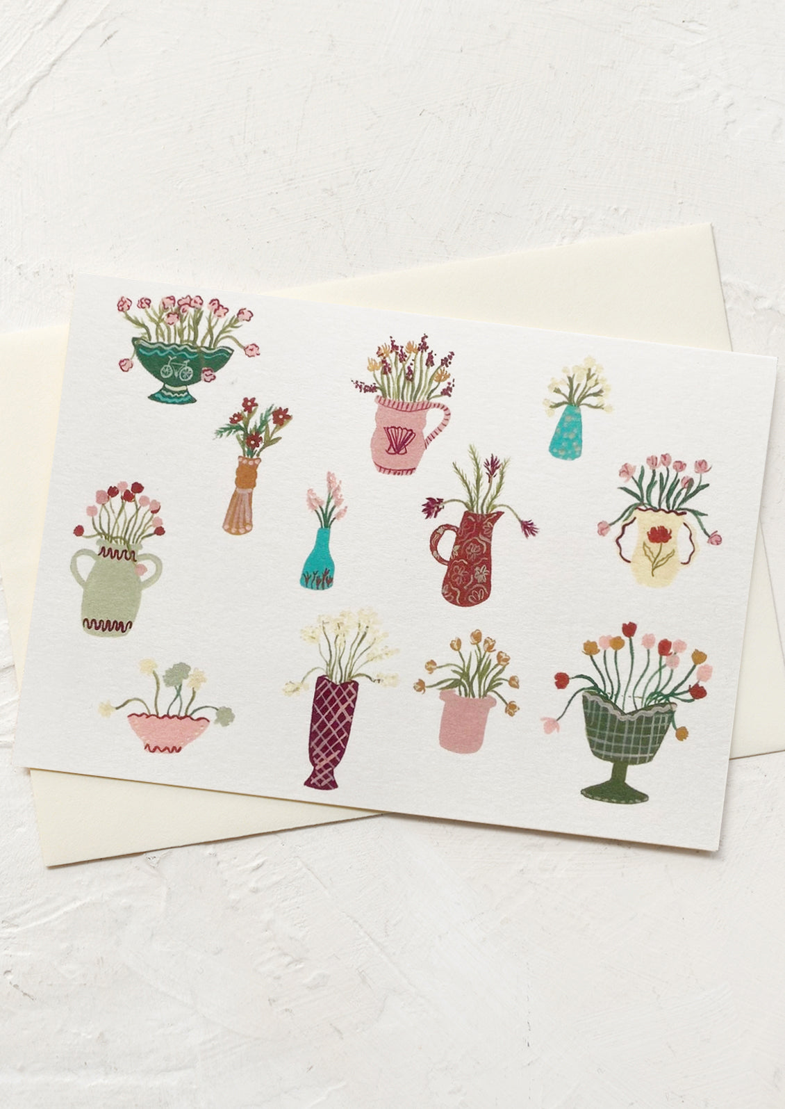 Card with illustrations of colorful vases and flowers on a white background