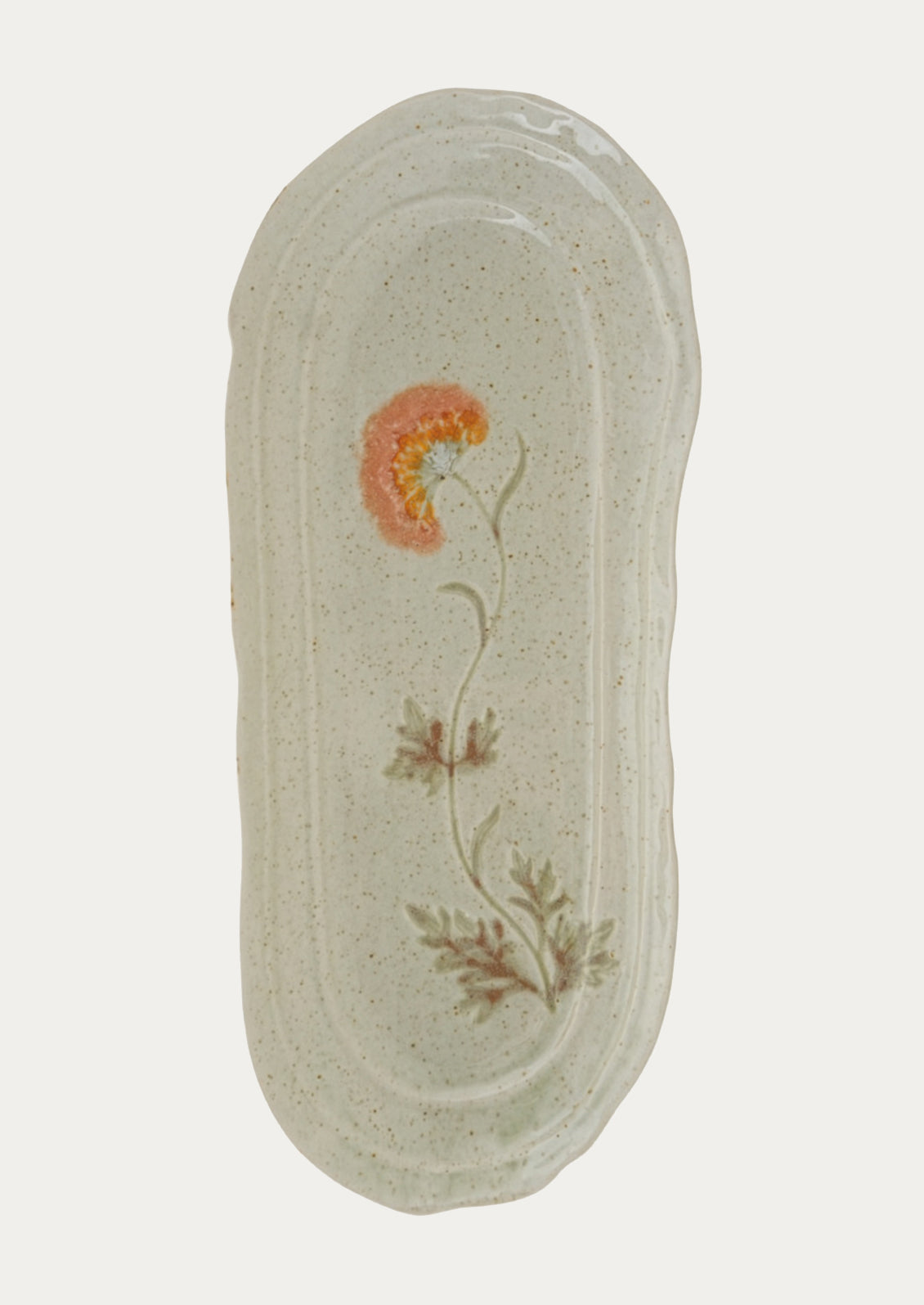 Decorative platter with floral design on a light gray background