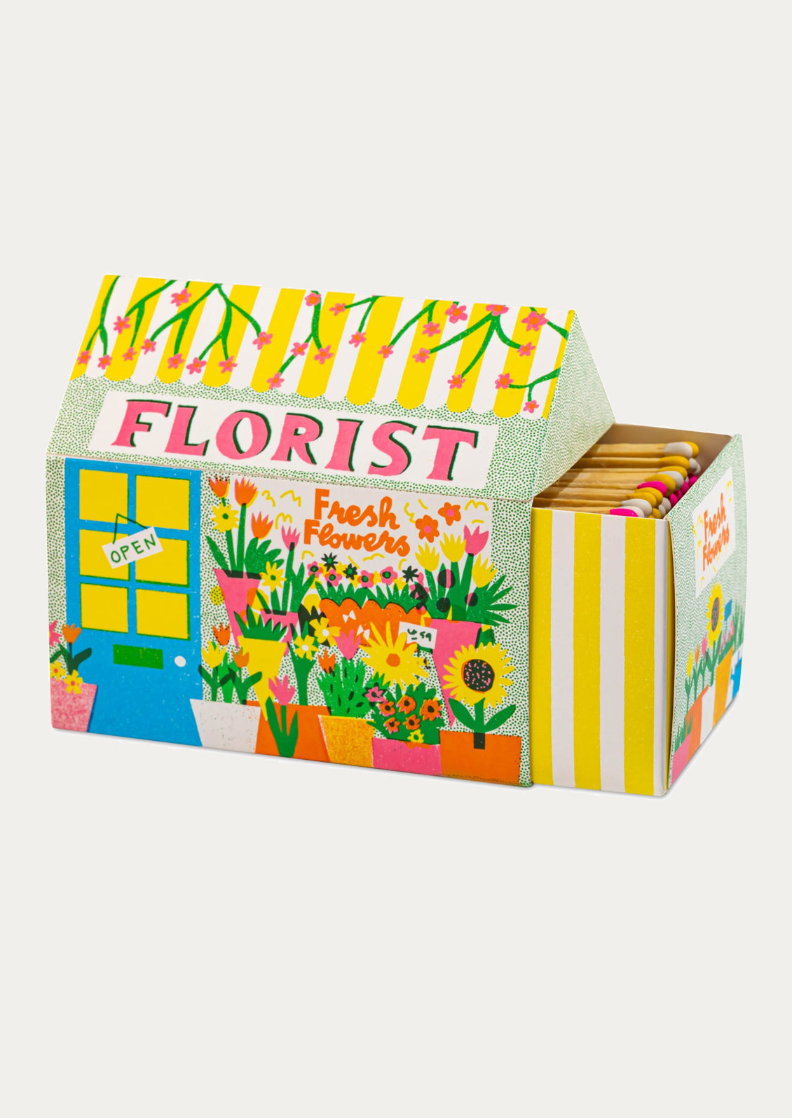A box of matches shaped like a house, illustrated to depict a florist shop.