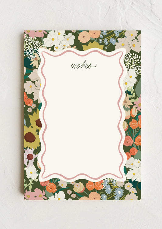Floral notepad with 'notes' text on a white background