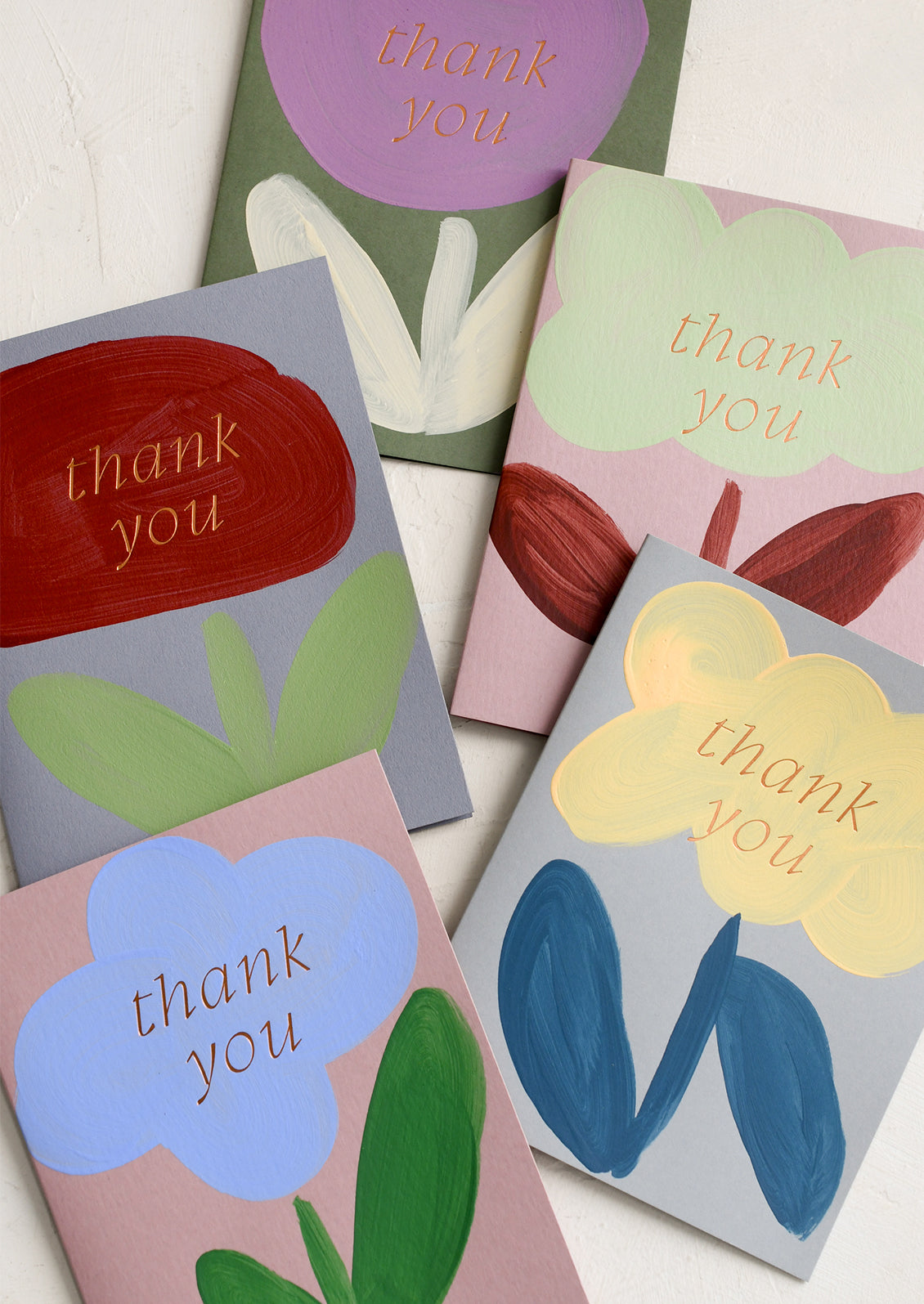 A set of thank you cards with hand painted modern flower.