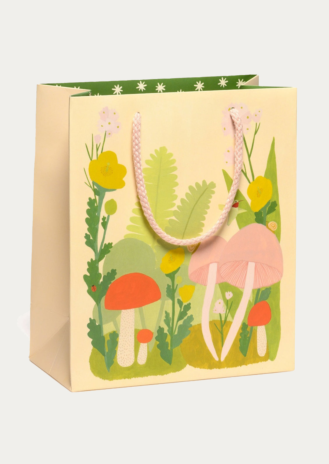 Gift bag with mushroom and plant design on a white background