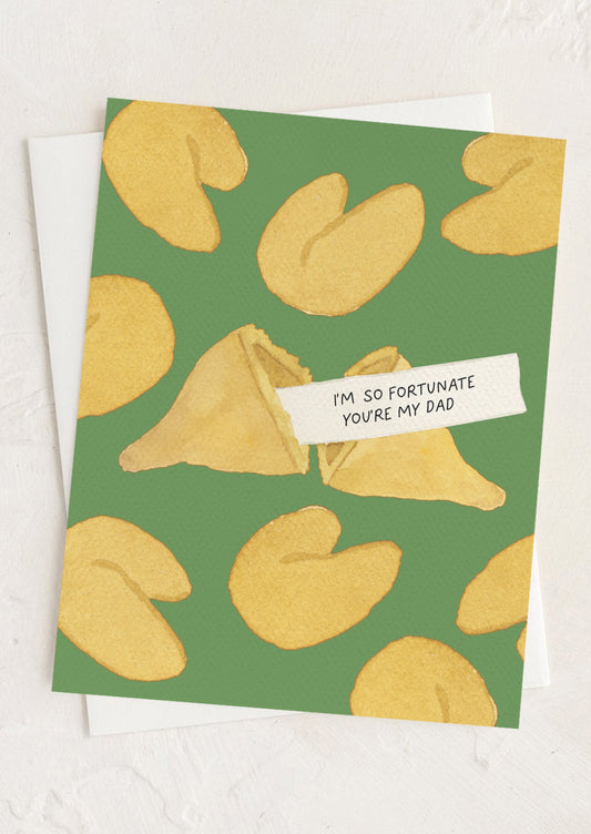 Greeting card with yellow fortune cookies on a green background and a humorous message.