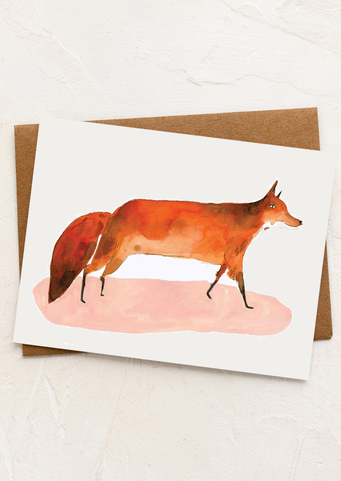 Greeting card with a watercolor fox illustration on a pink background